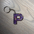 Lettre P mauve pailleté